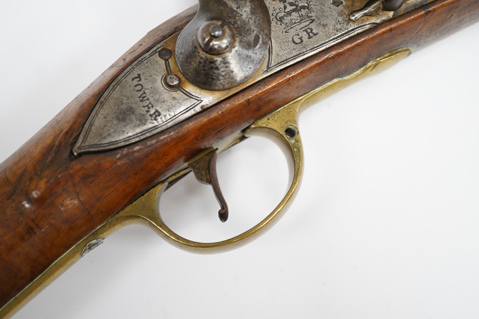 A ten bore flintlock musket of Brown Bess type, barrel 88cm, lock struck with crowned GR and Tower, regulation brass mounts. Condition - fair